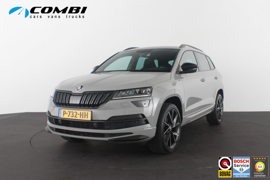 Škoda Karoq 1.5 TSI ACT Sportline Business > 150pk/Camera/Trekhaak wegklapbaar/Steel Grey/19inch...