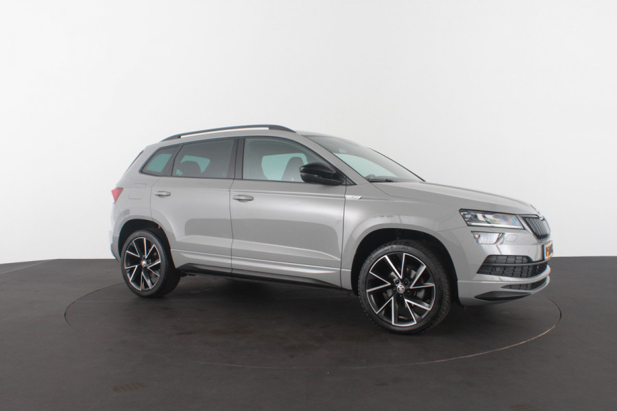 Škoda Karoq 1.5 TSI ACT Sportline Business > 150pk/Camera/Trekhaak wegklapbaar/Steel Grey/19inch...