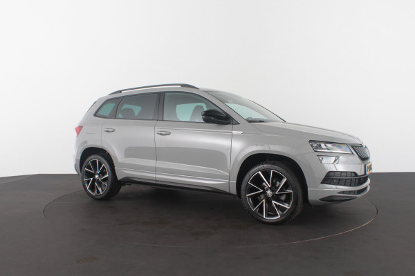 Škoda Karoq 1.5 TSI ACT Sportline Business > 150pk/Camera/Trekhaak wegklapbaar/Steel Grey/19inch...