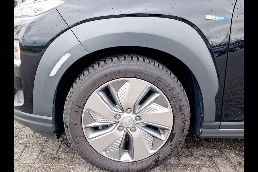 Hyundai Kona EV Fashion 64 kWh | SOH: 95,2% | 3 Fase | Warmtepomp | HUD | Navi | Adaptive CC | Blindspot |