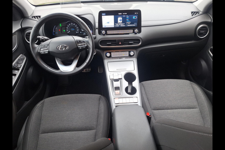 Hyundai Kona EV Fashion 64 kWh | SOH: 95,2% | 3 Fase | Warmtepomp | HUD | Navi | Adaptive CC | Blindspot |
