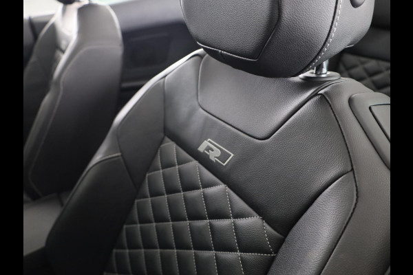 Volkswagen T-Roc 1.5 TSI R-Line 150 pk Automaat (DSG) | Leer Interieur | Navigatie | Parkeersensoren (Park assist) | Achteruitrijcamera | Windscherm | Stoel/stuur verwarming | Black Style pakket | R-Line |
