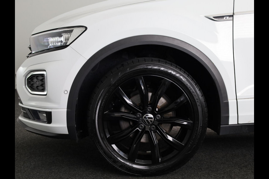 Volkswagen T-Roc 1.5 TSI R-Line 150 pk Automaat (DSG) | Leer Interieur | Navigatie | Parkeersensoren (Park assist) | Achteruitrijcamera | Windscherm | Stoel/stuur verwarming | Black Style pakket | R-Line |