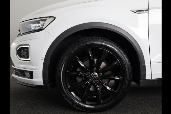 Volkswagen T-Roc 1.5 TSI R-Line 150 pk Automaat (DSG) | Leer Interieur | Navigatie | Parkeersensoren (Park assist) | Achteruitrijcamera | Windscherm | Stoel/stuur verwarming | Black Style pakket | R-Line |