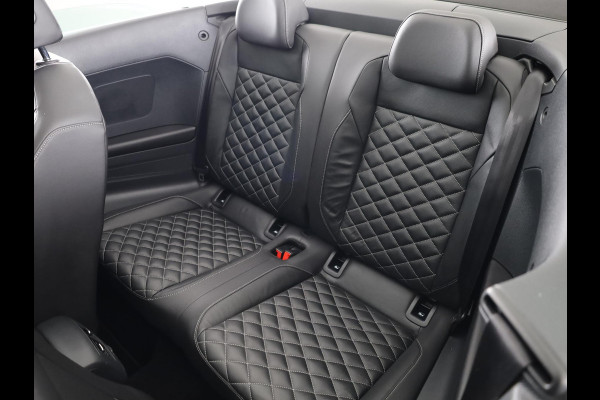 Volkswagen T-Roc 1.5 TSI R-Line 150 pk Automaat (DSG) | Leer Interieur | Navigatie | Parkeersensoren (Park assist) | Achteruitrijcamera | Windscherm | Stoel/stuur verwarming | Black Style pakket | R-Line |