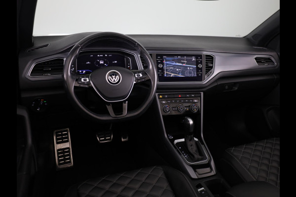 Volkswagen T-Roc 1.5 TSI R-Line 150 pk Automaat (DSG) | Leer Interieur | Navigatie | Parkeersensoren (Park assist) | Achteruitrijcamera | Windscherm | Stoel/stuur verwarming | Black Style pakket | R-Line |