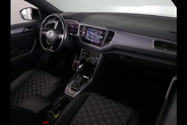 Volkswagen T-Roc 1.5 TSI R-Line 150 pk Automaat (DSG) | Leer Interieur | Navigatie | Parkeersensoren (Park assist) | Achteruitrijcamera | Windscherm | Stoel/stuur verwarming | Black Style pakket | R-Line |