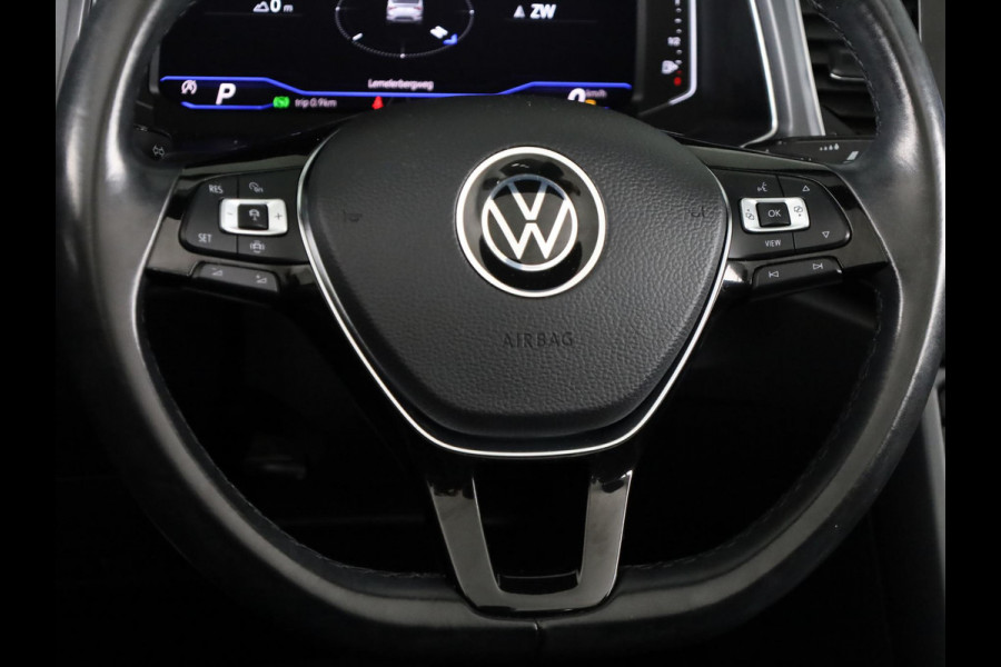 Volkswagen T-Roc 1.5 TSI R-Line 150 pk Automaat (DSG) | Leer Interieur | Navigatie | Parkeersensoren (Park assist) | Achteruitrijcamera | Windscherm | Stoel/stuur verwarming | Black Style pakket | R-Line |