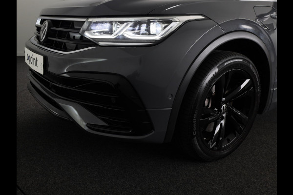 Volkswagen Tiguan 1.4 TSI eHybrid R-Line Business+ 245 pk Automaat (DSG) | Verlengde garantie | Navigatie | Panoramadak | Trekhaak (afneembaar) | Parkeersensoren (Park assist) | Achteruitrijcamera | Stoelverwarming |
