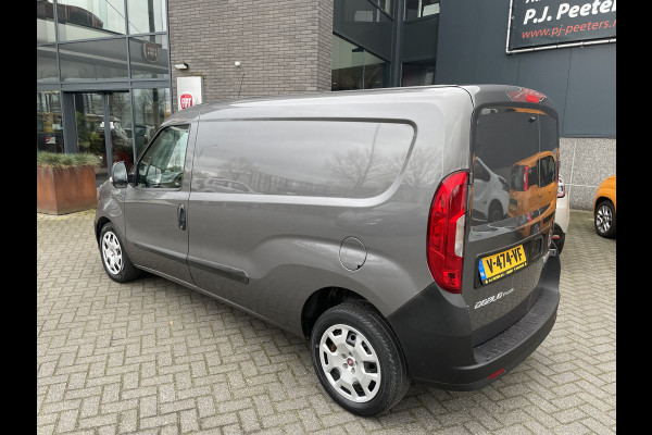 Fiat Doblò Cargo 1.6 MJ L2H1 Maxi Airco - Achteruitrijcamera - Navigatie - Cruise control - 3 zitplaatsen - Zijschuifdeur rechts - Tussenschot volledig - Elektrische ramen voor - Bluetooth - Stuur multifunctioneel - Radio