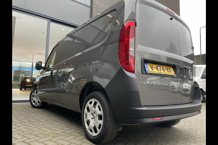 Fiat Doblò Cargo 1.6 MJ L2H1 Maxi Airco - Achteruitrijcamera - Navigatie - Cruise control - 3 zitplaatsen - Zijschuifdeur rechts - Tussenschot volledig - Elektrische ramen voor - Bluetooth - Stuur multifunctioneel - Radio
