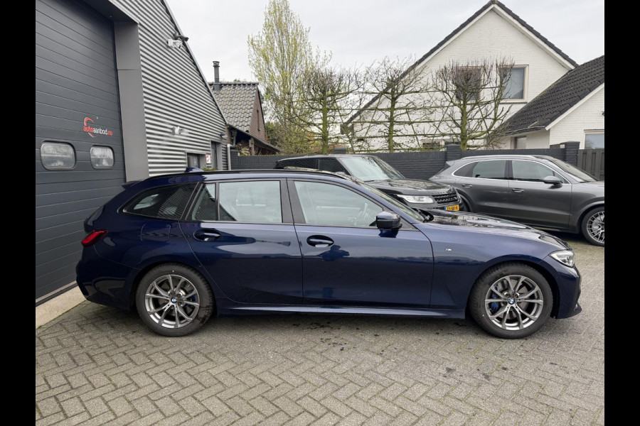 BMW 3 Serie Touring 320i High Executive M-Sport | Panoramadak | Camera | Head-Up Display | DAB |