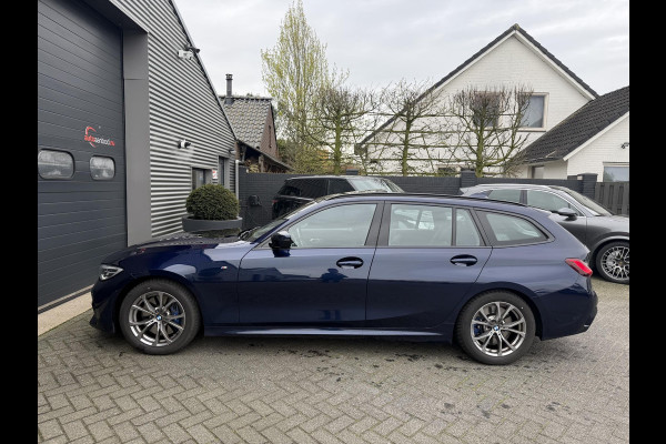 BMW 3 Serie Touring 320i High Executive M-Sport | Panoramadak | Camera | Head-Up Display | DAB |