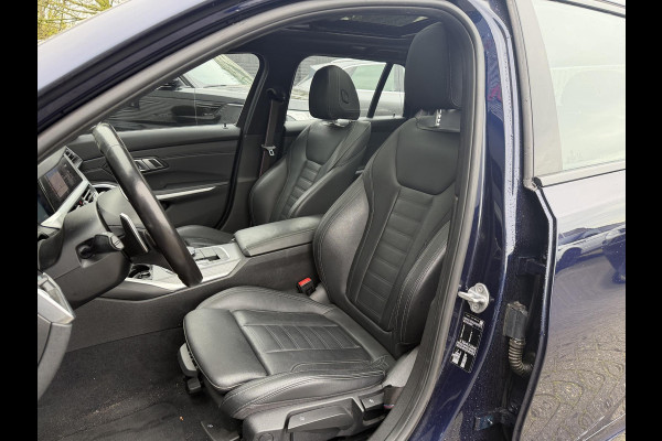 BMW 3 Serie Touring 320i High Executive M-Sport | Panoramadak | Camera | Head-Up Display | DAB |