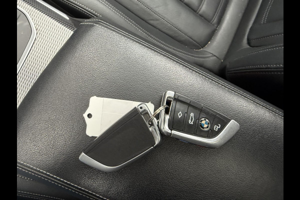 BMW 3 Serie Touring 320i High Executive M-Sport | Panoramadak | Camera | Head-Up Display | DAB |