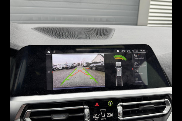 BMW 3 Serie Touring 320i High Executive M-Sport | Panoramadak | Camera | Head-Up Display | DAB |