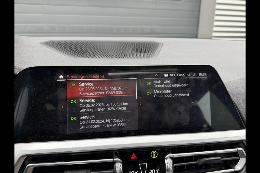 BMW 3 Serie Touring 320i High Executive M-Sport | Panoramadak | Camera | Head-Up Display | DAB |