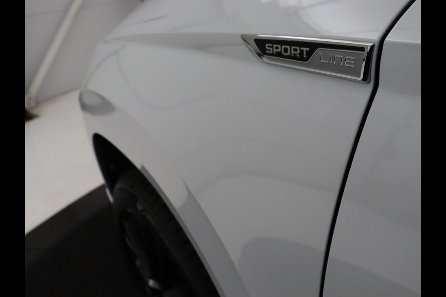 Škoda Karoq 1.5 TSI Sportline | Panoramadak | Stoelverwarming | Adaptive cruise | Camera | Sportstoelen | Virtual Cockpit | Navigatie | Sfeerverlichting | Full LED | 18'' | Keyless | Climate control