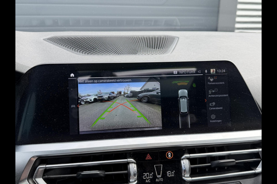 BMW 3 Serie Touring 320i High Executive M-Sport | Panoramadak | Camera | Head-Up Display | DAB | Stoelverwarming | Elektrische Achterklep |