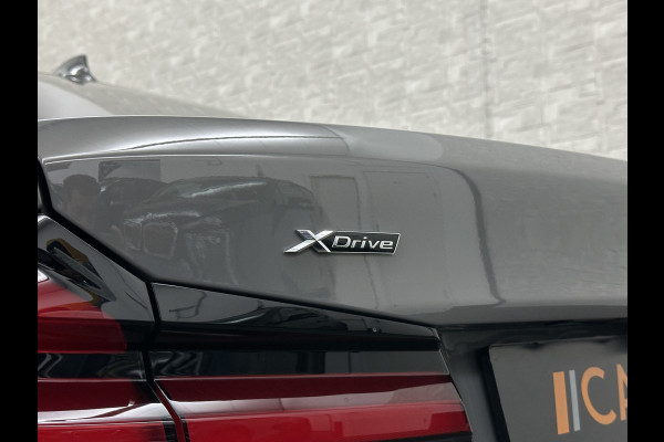 BMW 5 Serie 545e xDrive M-Sport | ACC | Head-Up | 19'' | Stuurverwarming | Sfeerverlichting | Carplay | Sportremmen | Getint Glas | Draadloos Laden | Sportstoelen | Live Cockpit Pro | LED |