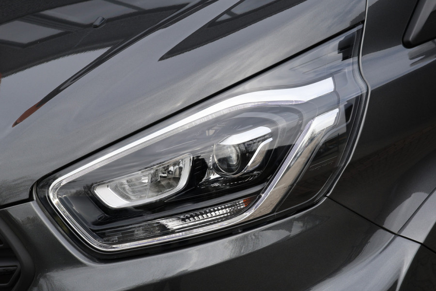 Ford Transit Custom MS-RT 320 2.0 TDCI L2H1 DC | ACC | BLIS | Bi-Xenon | Elek stoel | CarPlay | Navigatie | Camera | Stoelverwarming | L+R Schuifdeur | Lederen bekleding | Spoiler-pakket | Nieuwe APK | Verlengde fabrieksgarantie