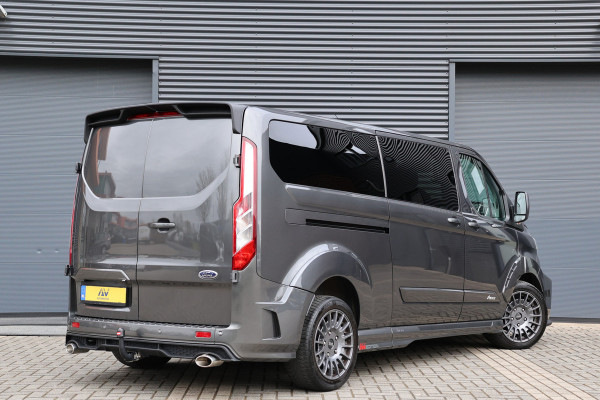 Ford Transit Custom 320 2.0 TDCI L2H1 MS-RT | ACC | BLIS | L+R Schuifdeur | SORTIMO | CarPlay | Navigatie | Camera | Stoelverwarming | 3-Zitter | PPF Folie | Lederen bekleding | Spoiler-pakket | Nieuwe APK