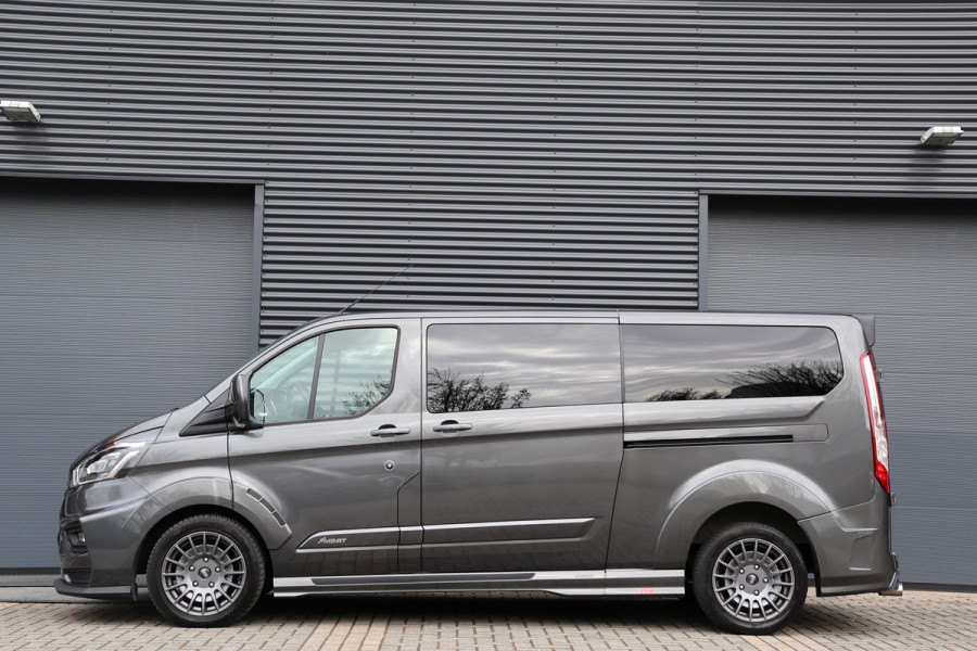 Ford Transit Custom 320 2.0 TDCI L2H1 MS-RT | ACC | BLIS | L+R Schuifdeur | SORTIMO | CarPlay | Navigatie | Camera | Stoelverwarming | 3-Zitter | PPF Folie | Lederen bekleding | Spoiler-pakket | Nieuwe APK