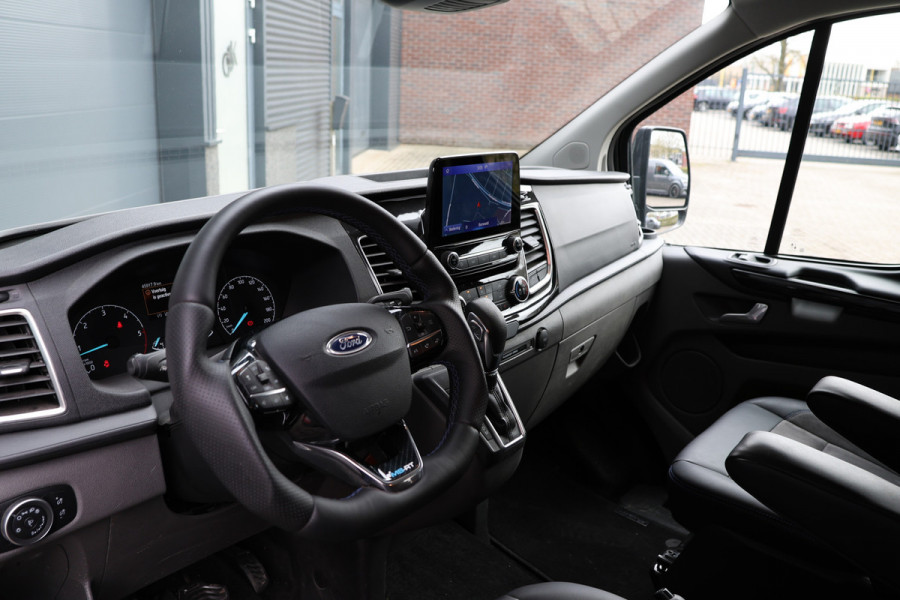 Ford Transit Custom 320 2.0 TDCI L2H1 MS-RT | ACC | BLIS | L+R Schuifdeur | SORTIMO | CarPlay | Navigatie | Camera | Stoelverwarming | 3-Zitter | PPF Folie | Lederen bekleding | Spoiler-pakket | Nieuwe APK
