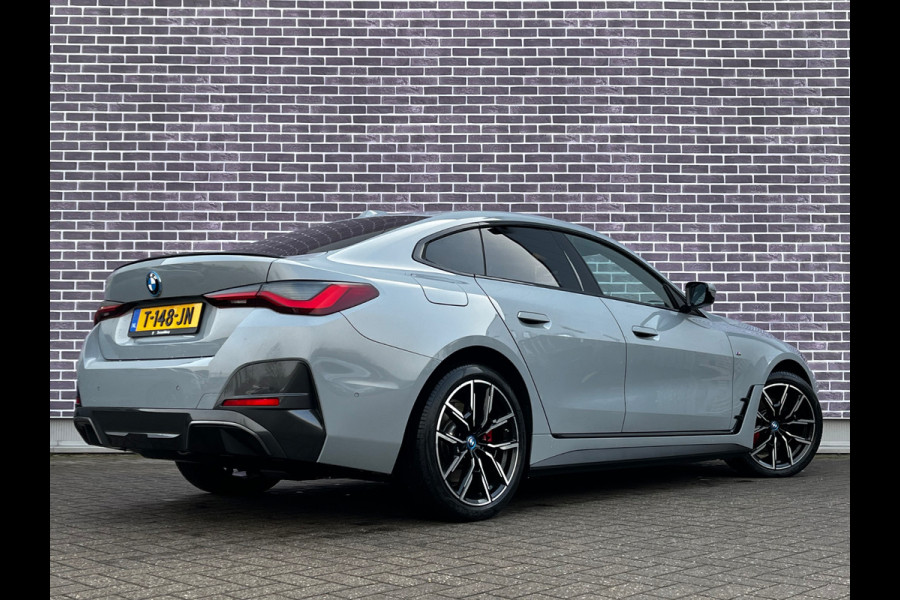 BMW i4 eDrive40 High Executive 84 kWh / SoH 93,5% / Trekhaak / 360Camera / Head-up / Leder / 19'' / Navigatie / Stoelverwarming / DAB / Cruise Control