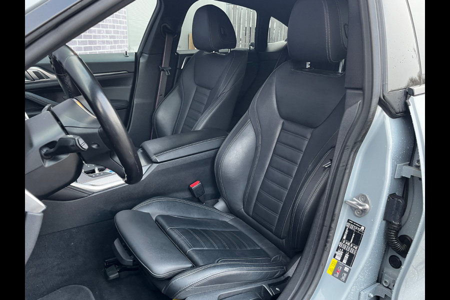 BMW i4 eDrive40 High Executive 84 kWh / SoH 93,5% / Trekhaak / 360Camera / Head-up / Leder / 19'' / Navigatie / Stoelverwarming / DAB / Cruise Control