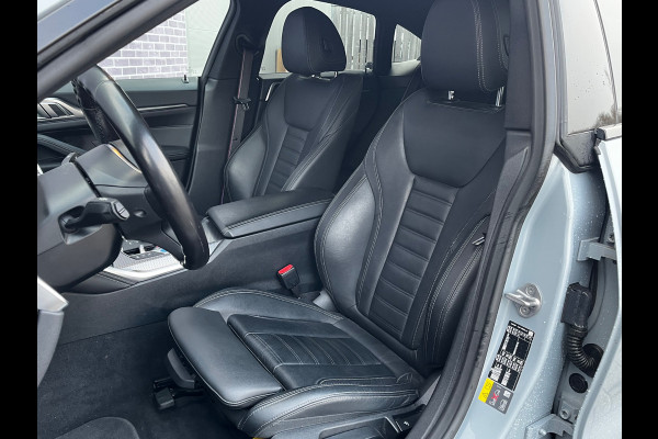 BMW i4 eDrive40 High Executive 84 kWh / SoH 93,5% / Trekhaak / 360Camera / Head-up / Leder / 19'' / Navigatie / Stoelverwarming / DAB / Cruise Control