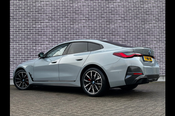 BMW i4 eDrive40 High Executive 84 kWh / SoH 93,5% / Trekhaak / 360Camera / Head-up / Leder / 19'' / Navigatie / Stoelverwarming / DAB / Cruise Control