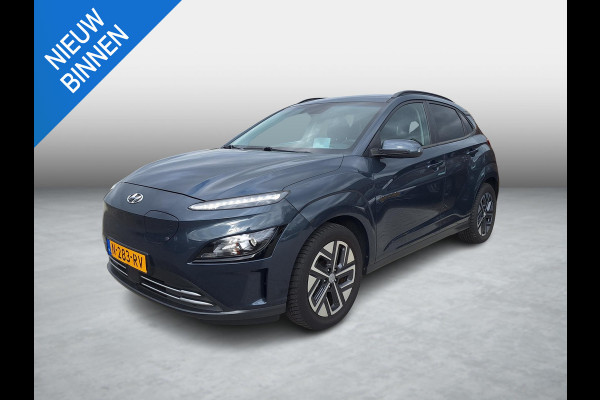 Hyundai Kona EV Fashion 64 kWh | SOH: nnb | 3 Fase | Warmtepomp | Blindspot | Navi | Camera |
