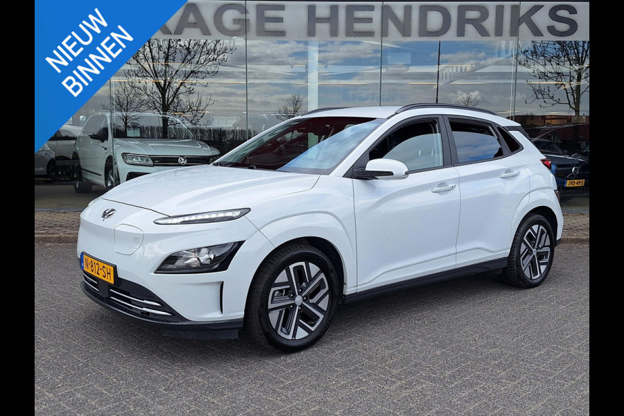 Hyundai Kona EV Fashion 64 kWh | SOH: nnb | 3 Fase | Warmtepomp | Blindspot | Navi | Camera |