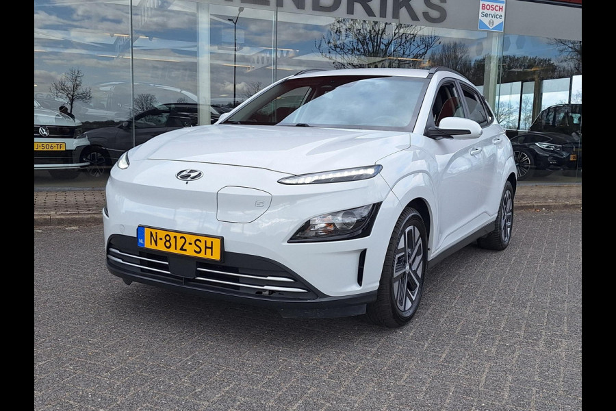 Hyundai Kona EV Fashion 64 kWh | SOH: nnb | 3 Fase | Warmtepomp | Blindspot | Navi | Camera |