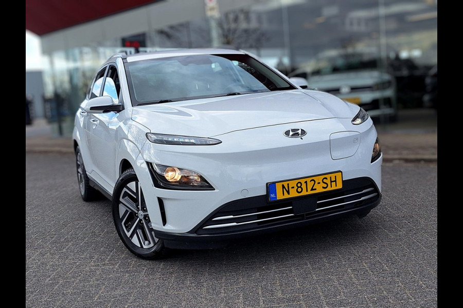 Hyundai Kona EV Fashion 64 kWh | SOH: nnb | 3 Fase | Warmtepomp | Blindspot | Navi | Camera |