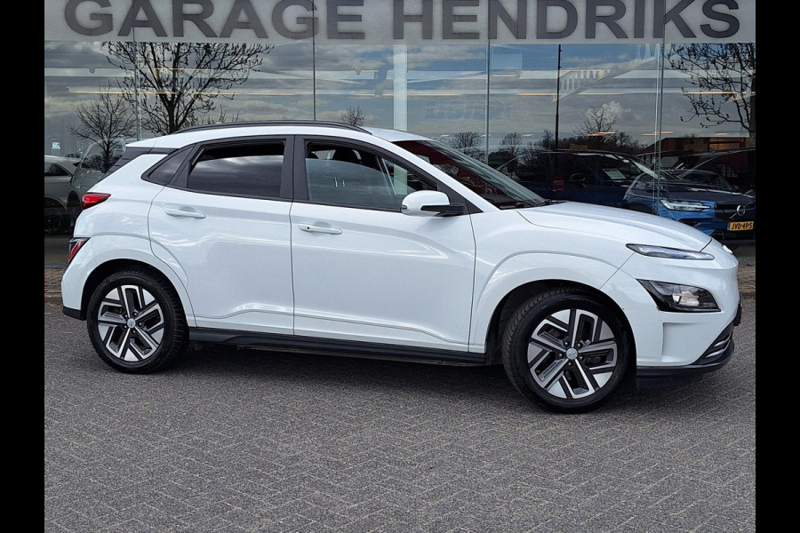 Hyundai Kona EV Fashion 64 kWh | SOH: nnb | 3 Fase | Warmtepomp | Blindspot | Navi | Camera |