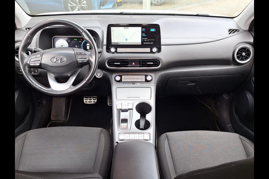 Hyundai Kona EV Fashion 64 kWh | SOH: nnb | 3 Fase | Warmtepomp | Blindspot | Navi | Camera |