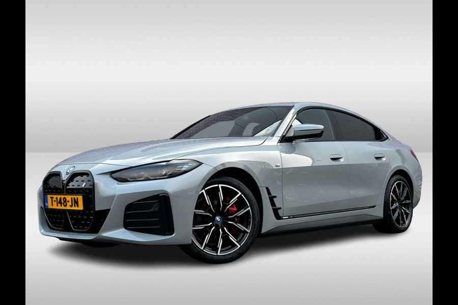 BMW i4 eDrive40 High Executive 84 kWh / SoH 93,5% / Trekhaak / 360Camera / Head-up / Leder / 19'' / Navigatie / Stoelverwarming / DAB / Cruise Control
