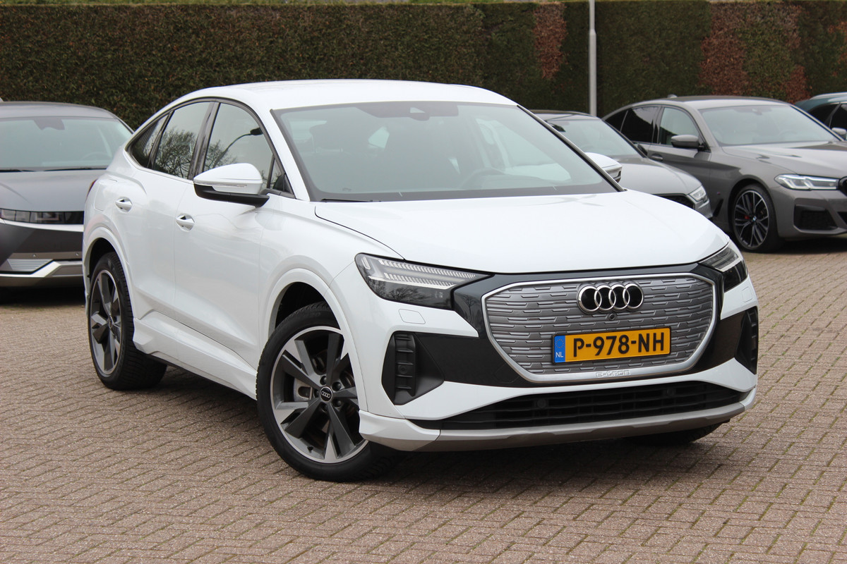 Audi Q4 Sportback e-tron 40 Launch edition Advanced 77 kWh / SoH 93,8% / CarPlay / Matrix LED / Sportstoelen / Sonos Audio / Virtual Cockpit / Parkeerhulp V+A / Intr.voorverwarming / Stoelverwarming / DAB / Cruise Control