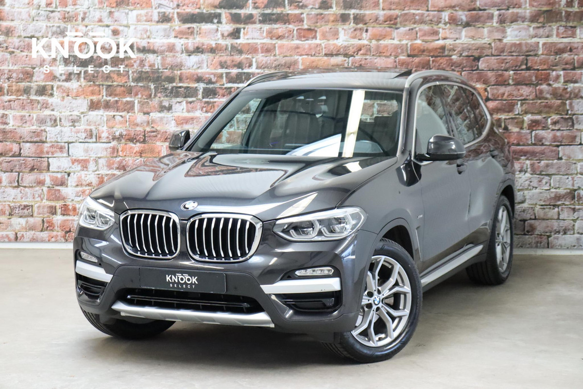 BMW X3 xDrive20i High Executive xLine Automaat / Panoramadak / Trekhaak / Navigatiesysteem Professional / Leder / Comfortstoelen Elektrisch Verstelbaar / Stuurwielverwarming / Chrome Line / Stoelventilatie / Hifi / Multifunctioneel Instrumentendisplay / LED /
