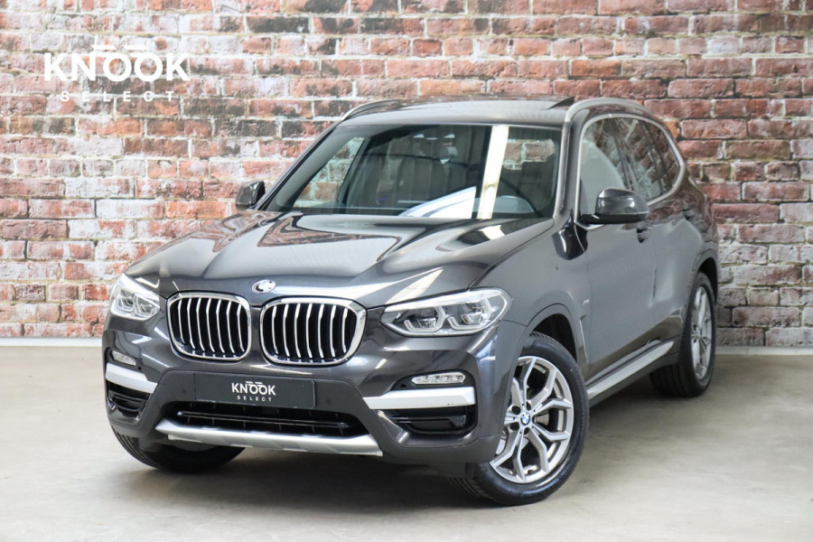 BMW X3 xDrive20i High Executive xLine Automaat / Panoramadak / Trekhaak / Navigatiesysteem Professional / Leder / Comfortstoelen Elektrisch Verstelbaar / Stuurwielverwarming / Chrome Line / Stoelventilatie / Hifi / Multifunctioneel Instrumentendisplay / LED /