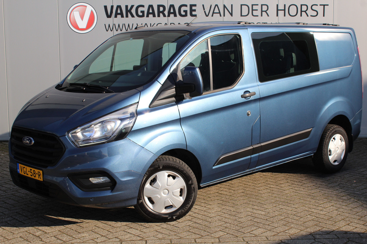 Ford Transit Custom 300 2.0-130pk TDCI L1H1 Trend Dubb. cabine. Trekgewicht 2.500kg ! Airco, stoel- spiegelverwarming, bijrijdersstoel, dubbele cabine, trekhaak, parkeersensoren v+a, navigatie, telefoonvoorb., metallic lak
