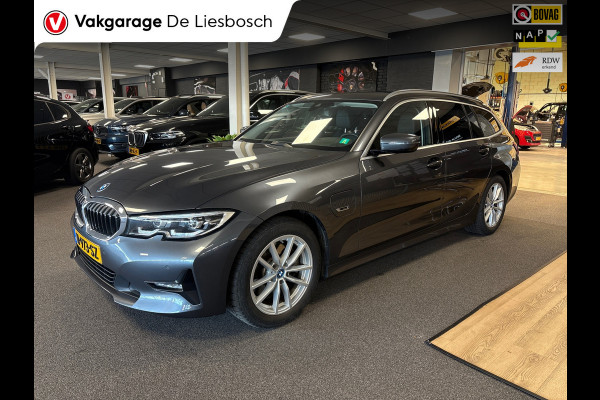 BMW 3 Serie Touring 320e Business Edition Plus,leer,navi,trekhaak,orig ned ,dealer onderhouden