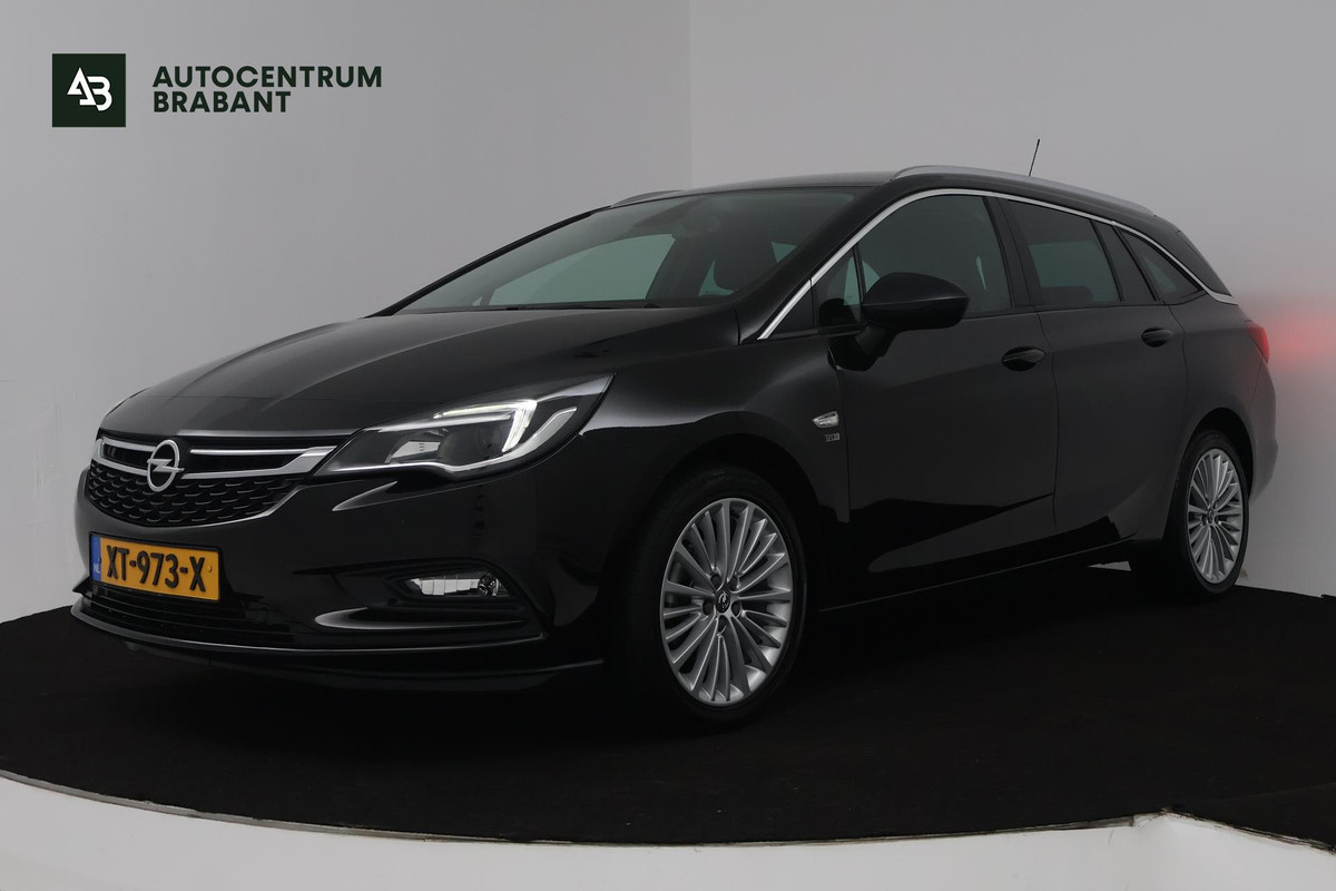 Opel Astra Sports Tourer 1.4 Turbo 120 Jaar Edition (TREKHAAK, PARKEERSENSOREN, CRUISE CONTROL, NAVIGATIE)