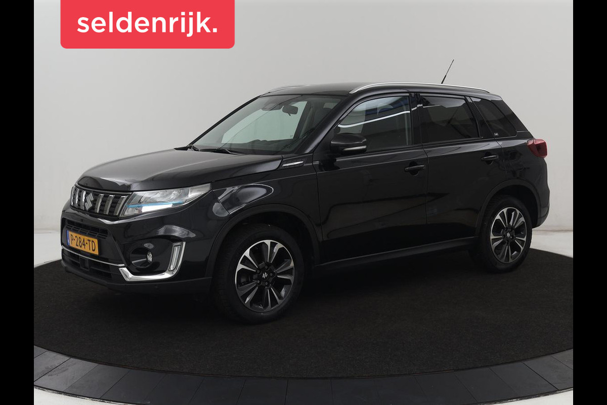 Suzuki Vitara 1.5 Hybrid Style | Trekhaak | Stoelverwarming | Adaptive cruise | Camera | Carplay | Leder/Alcantara | Full LED | Keyless | Navigatie | Climate control | Parkeerhulp