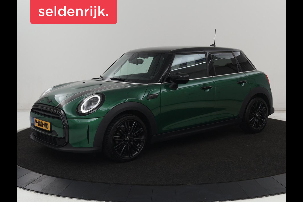 MINI Cooper 1.5 Business Edition | Harman/Kardon | Carplay | Verwarmde voorruit | Navigatie | Full LED | Half leder | Parkeerhulp | Climate control | Cruise control | Bluetooth | British Racing Green