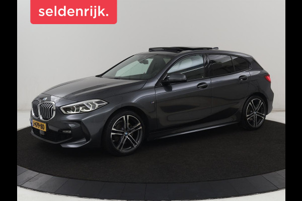 BMW 1-serie 118i M Sport | Panoramadak | Stoelverwarming | Harman/Kardon | Camera | Live Cockpit | Carplay | Sfeerverlichting | Sportstoelen | Full LED | Navigatie | Half leder | Park Assist | Climate control
