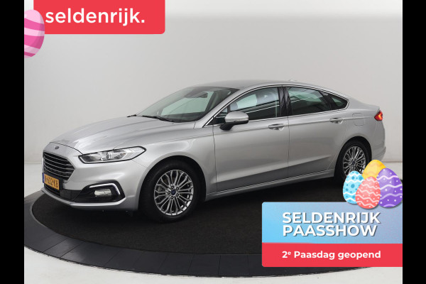 Ford Mondeo 2.0 IVCT HEV Titanium | Stoelverwarming | Carplay | Keyless | Navigatie | Climate control | Parkeerhulp | Cruise control | Bluetooth | DAB | Verwarmde voorruit