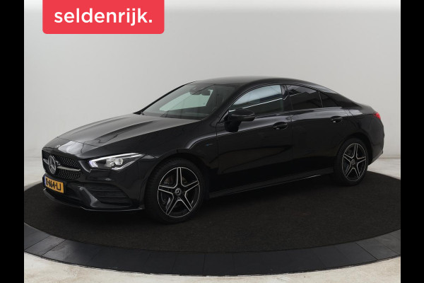 Mercedes-Benz CLA-Klasse 250e AMG | SOH 98% | Stoelverwarming | Widescreen | Sfeerverlichting | Full LED | Park Assist | Camera | Navigatie | Half leder | PHEV | Plug In